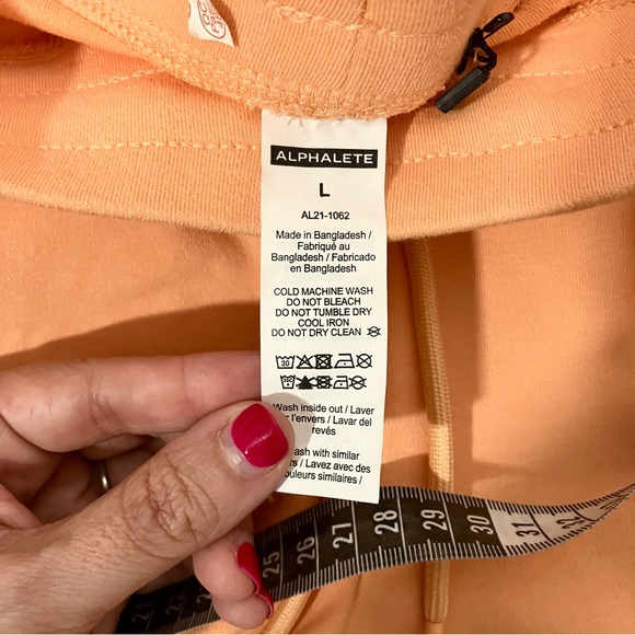 Alphalete NWPT L & S Essential Core women’s athletic shorts light orange - Picture 11 of 13